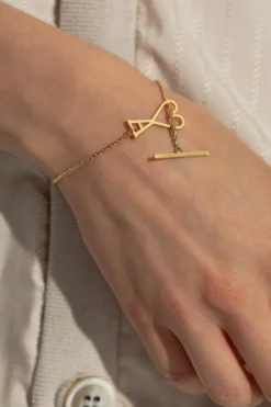 Ami Alexandre Mattiussi ZŁOTY Bransoleta z zawieszka w kształcie logo