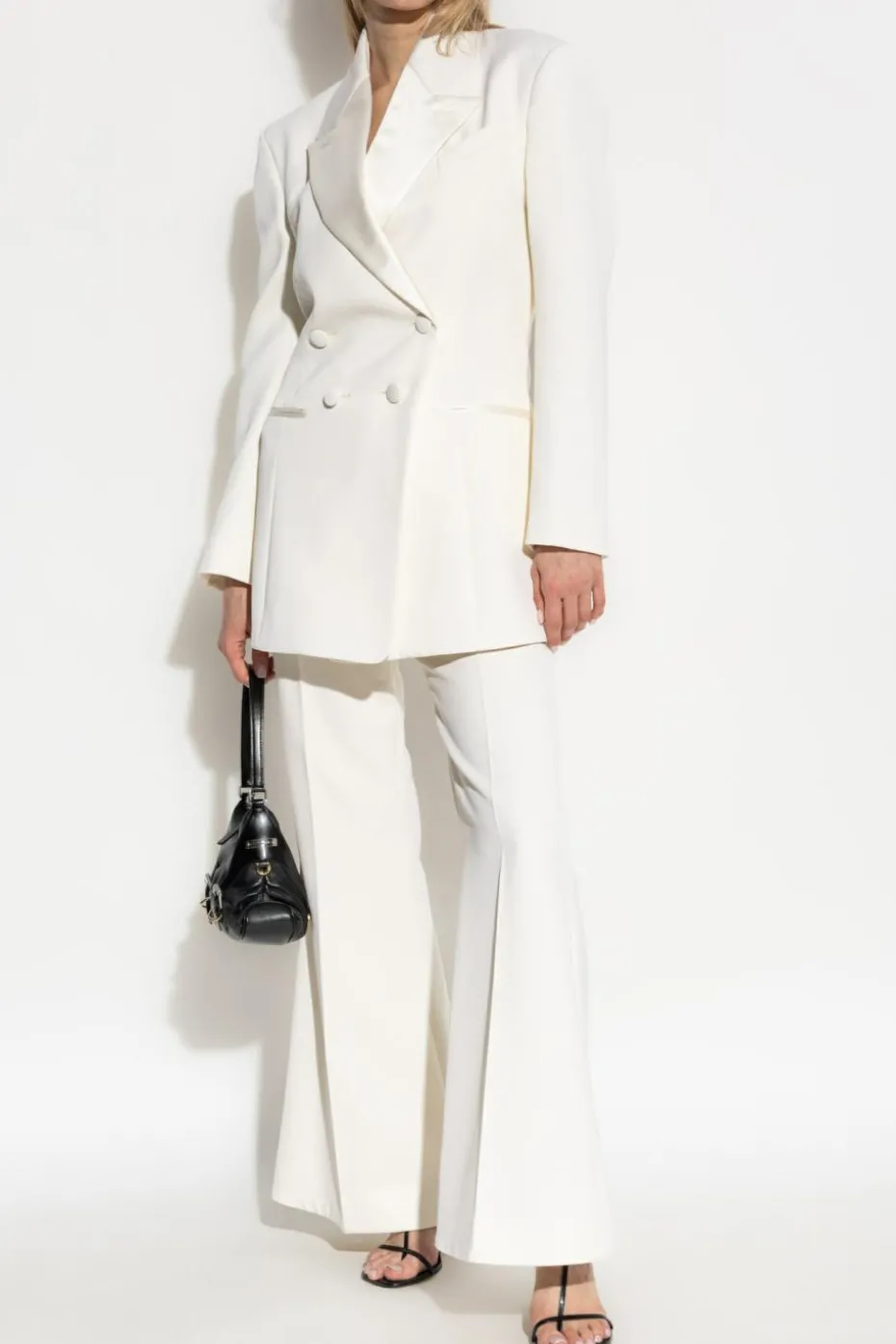 Givenchy kremowy Spodnie z rozszerzanymi nogawkami w kant